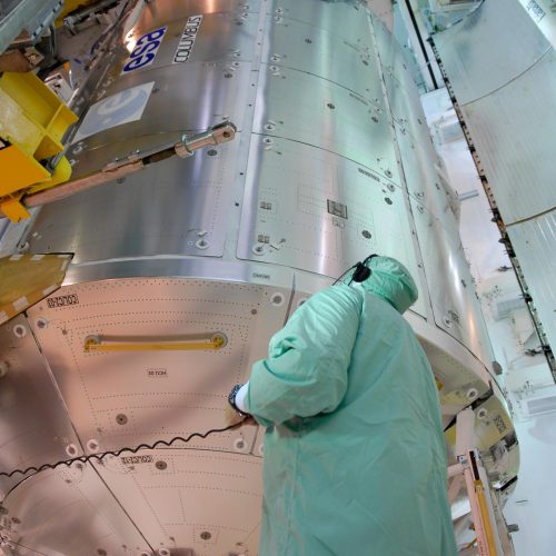 The European Columbus laboratory is transferred into Space Shuttle Atlantis payload bay 